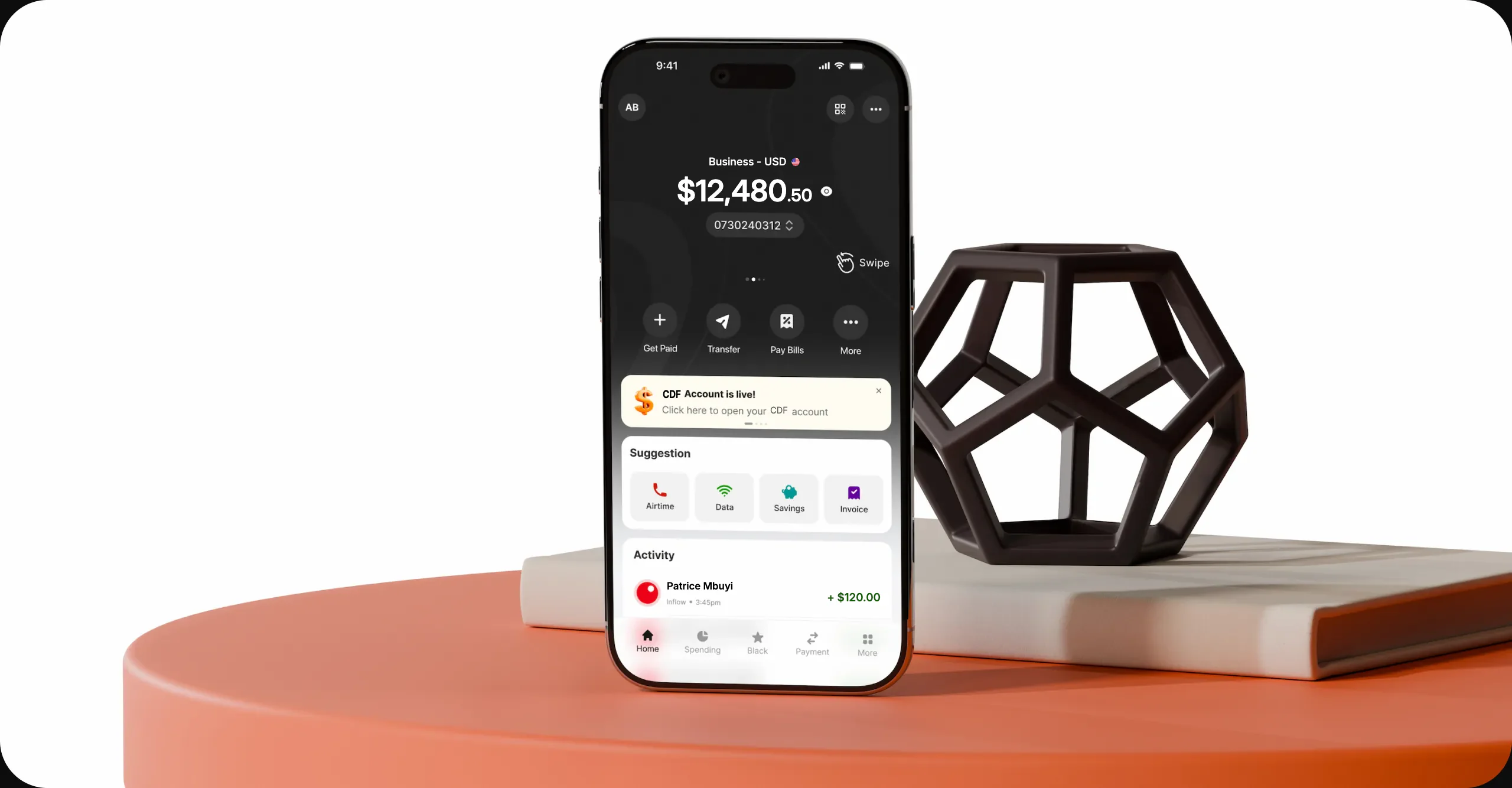 Compte professionnel Nomba en dollars sur mobile, dans une mise en scène produit
