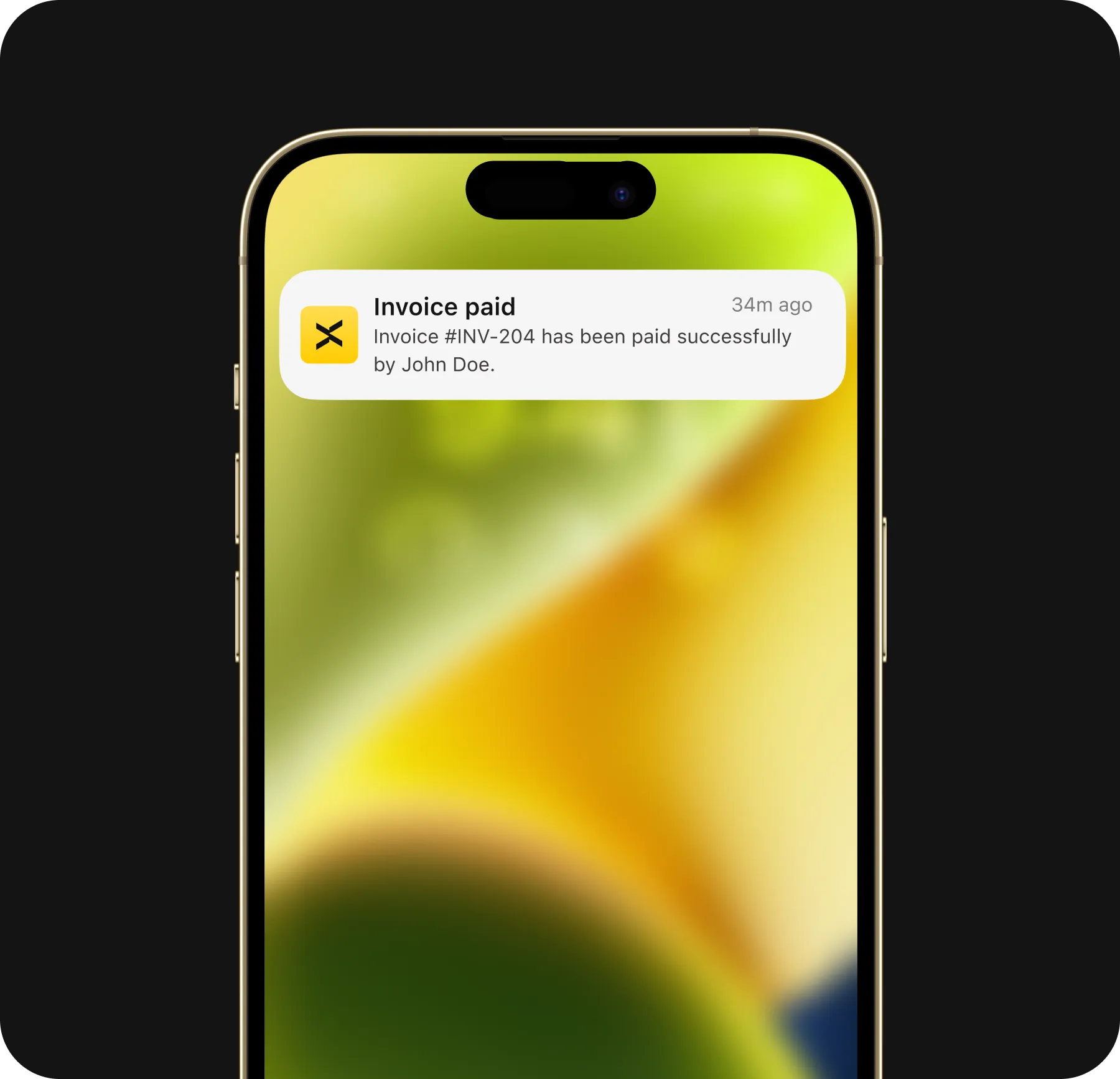 Nomba app showing an instant invoice payment notification on a phone lock screen
